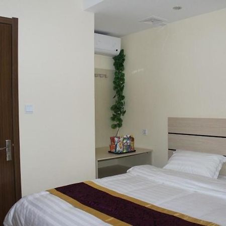 Dalian Kai Bin Business Inn Далянь Экстерьер фото