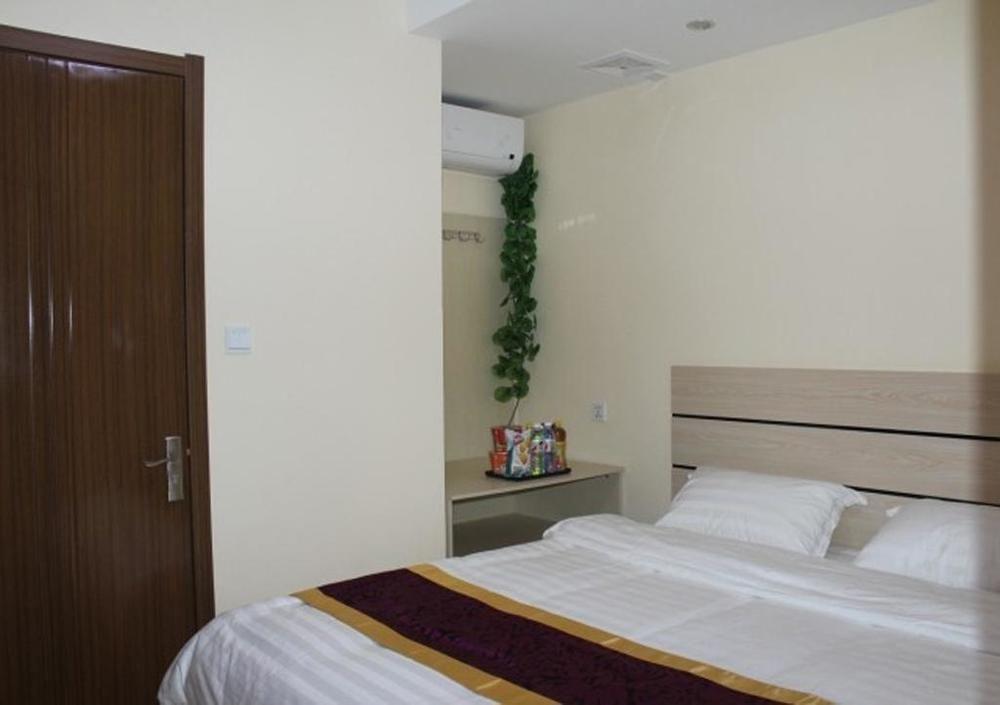 Dalian Kai Bin Business Inn Далянь Экстерьер фото