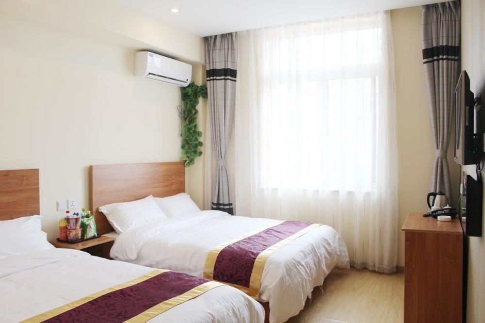 Dalian Kai Bin Business Inn Далянь Экстерьер фото