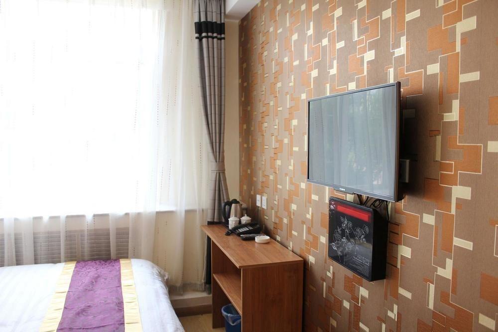 Dalian Kai Bin Business Inn Далянь Экстерьер фото