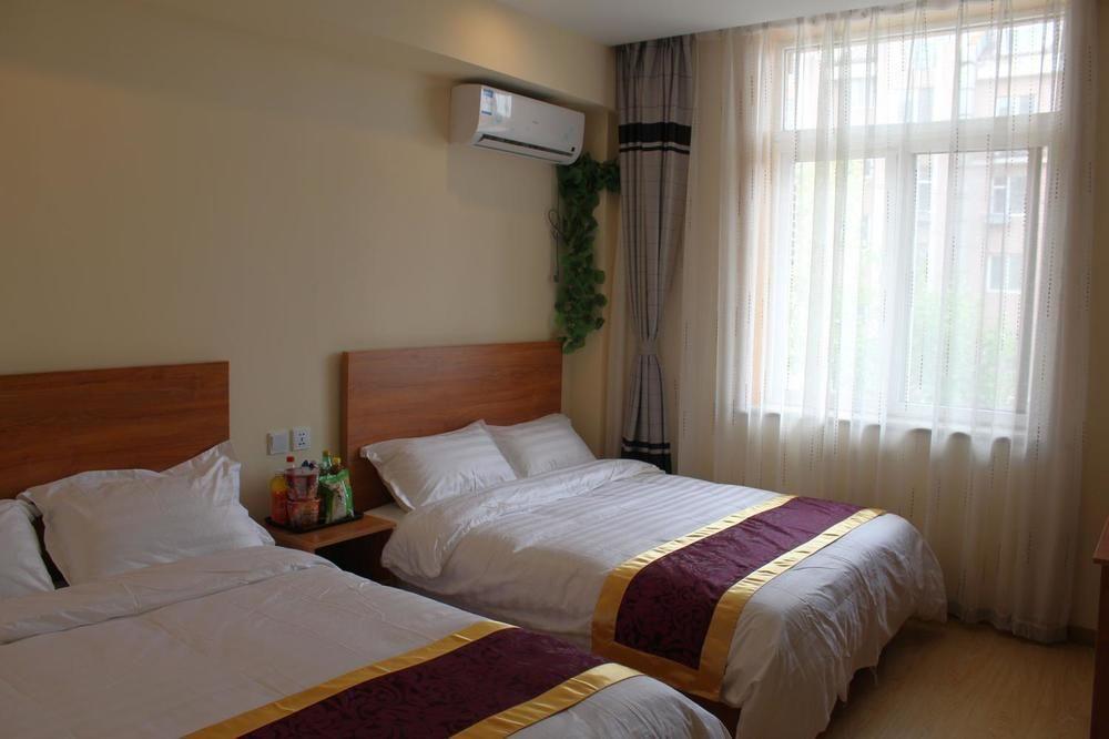 Dalian Kai Bin Business Inn Далянь Экстерьер фото
