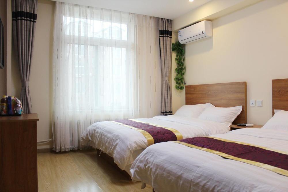 Dalian Kai Bin Business Inn Далянь Экстерьер фото