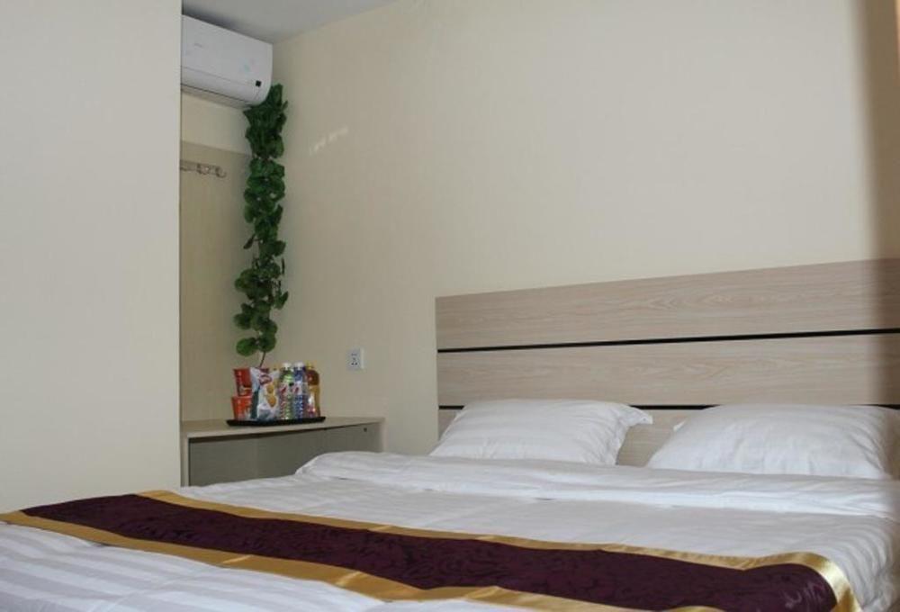 Dalian Kai Bin Business Inn Далянь Экстерьер фото