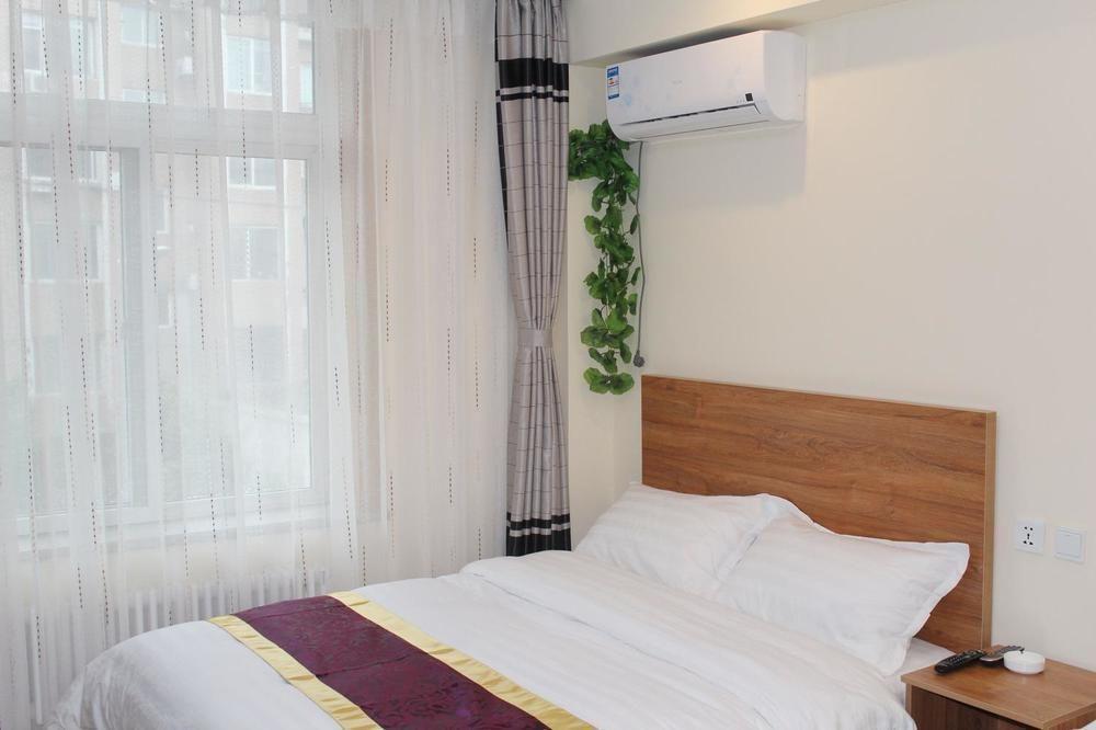 Dalian Kai Bin Business Inn Далянь Экстерьер фото