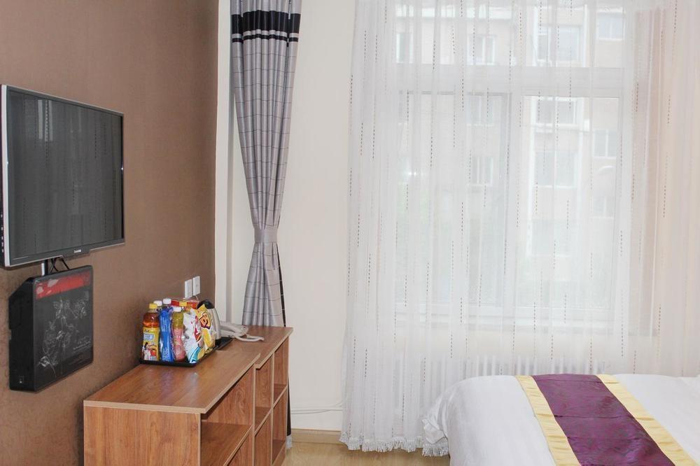 Dalian Kai Bin Business Inn Далянь Экстерьер фото